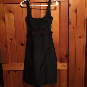Black taffeta dress with pockets